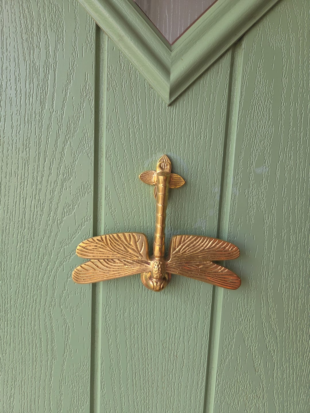 Customer photo review of Dragonfly Door Knocker | Solid Brass