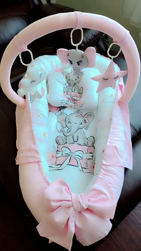 Customer photo review of Baby Nest "Pink Elephant" with Bow & Toys