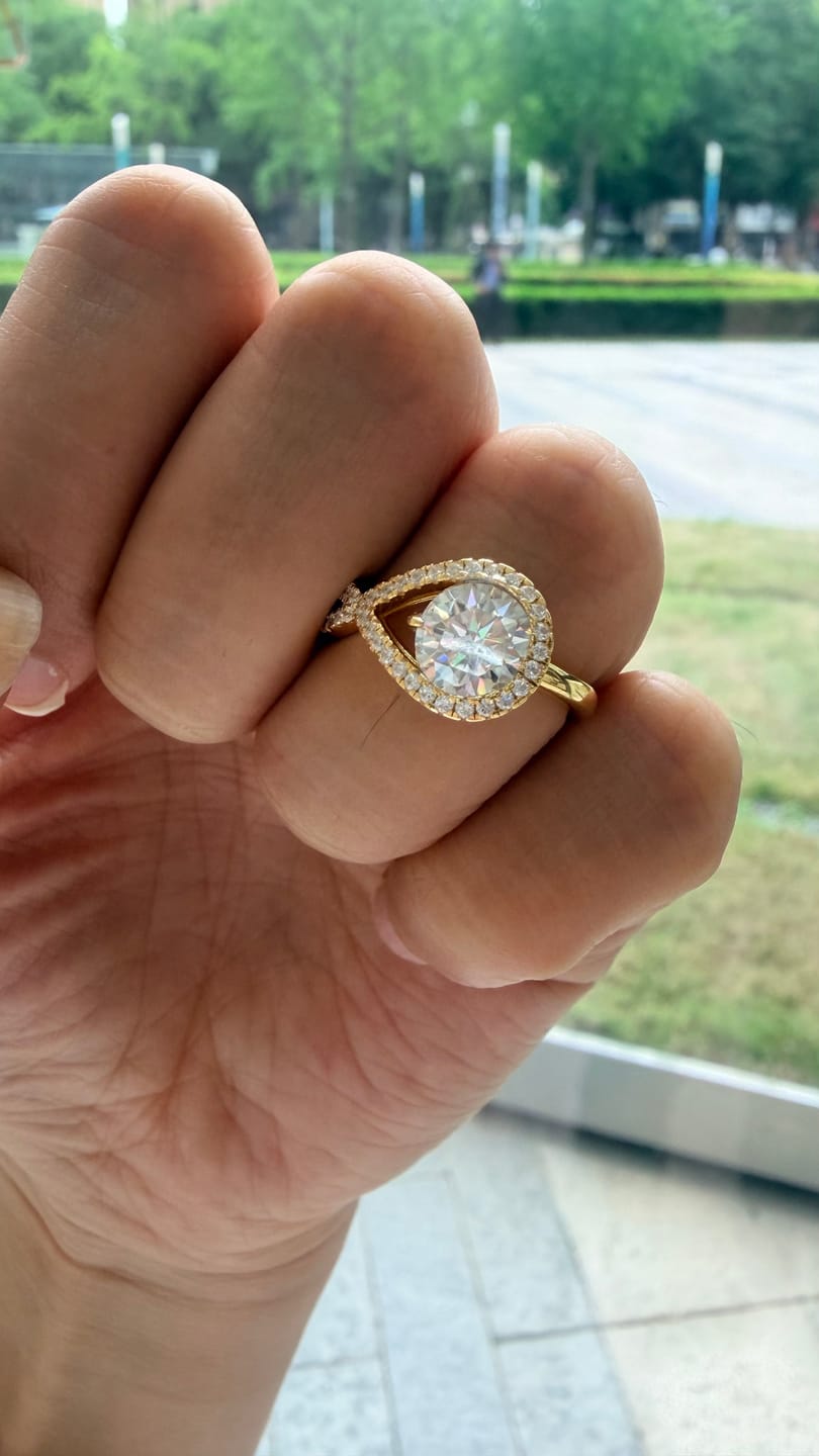 Customer photo review of S925 Moissanite Halo 1.2Ct Round Cut Yellow Gold Engagement Ring
