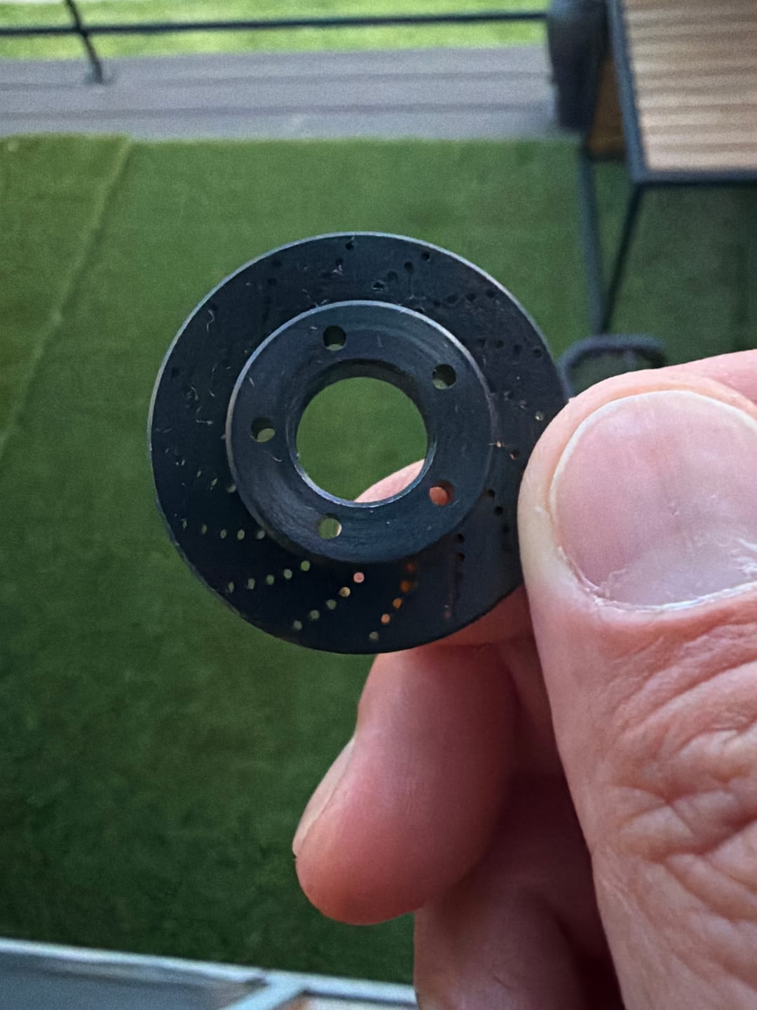 Customer photo review of Rotor Golf Ball Marker - Black Oxide Carbon Steel | Kraken Golf