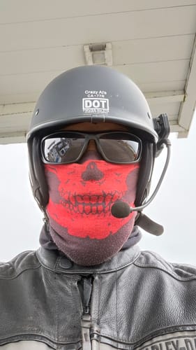 Customer's front view wearing the matte black Switchback DOT Reversible Helmet with the brim facing forward.