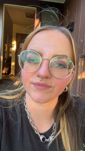 Close-up of a reviewer wearing the silver SUNNY & LUNA REAL SEPTUM piercing.