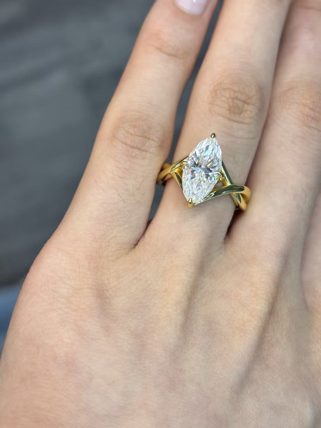 Customer photo review of S925 Moissanite Twist 3.0Ct Marquise Cut Yellow Gold Engagement Ring