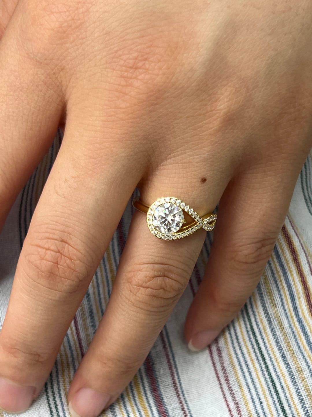 Customer photo review of S925 Moissanite Halo 1.2Ct Round Cut Yellow Gold Engagement Ring