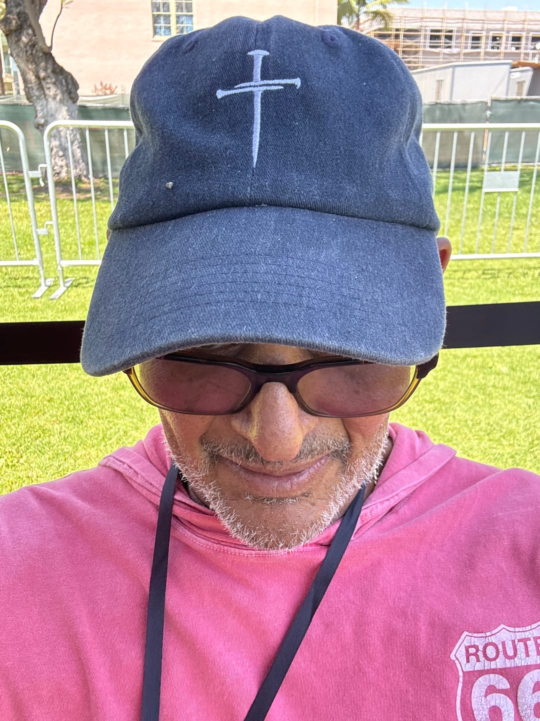 Customer photo review of Christianartworkshop Minimalist Nail Cross Embroidered Trucker Hat