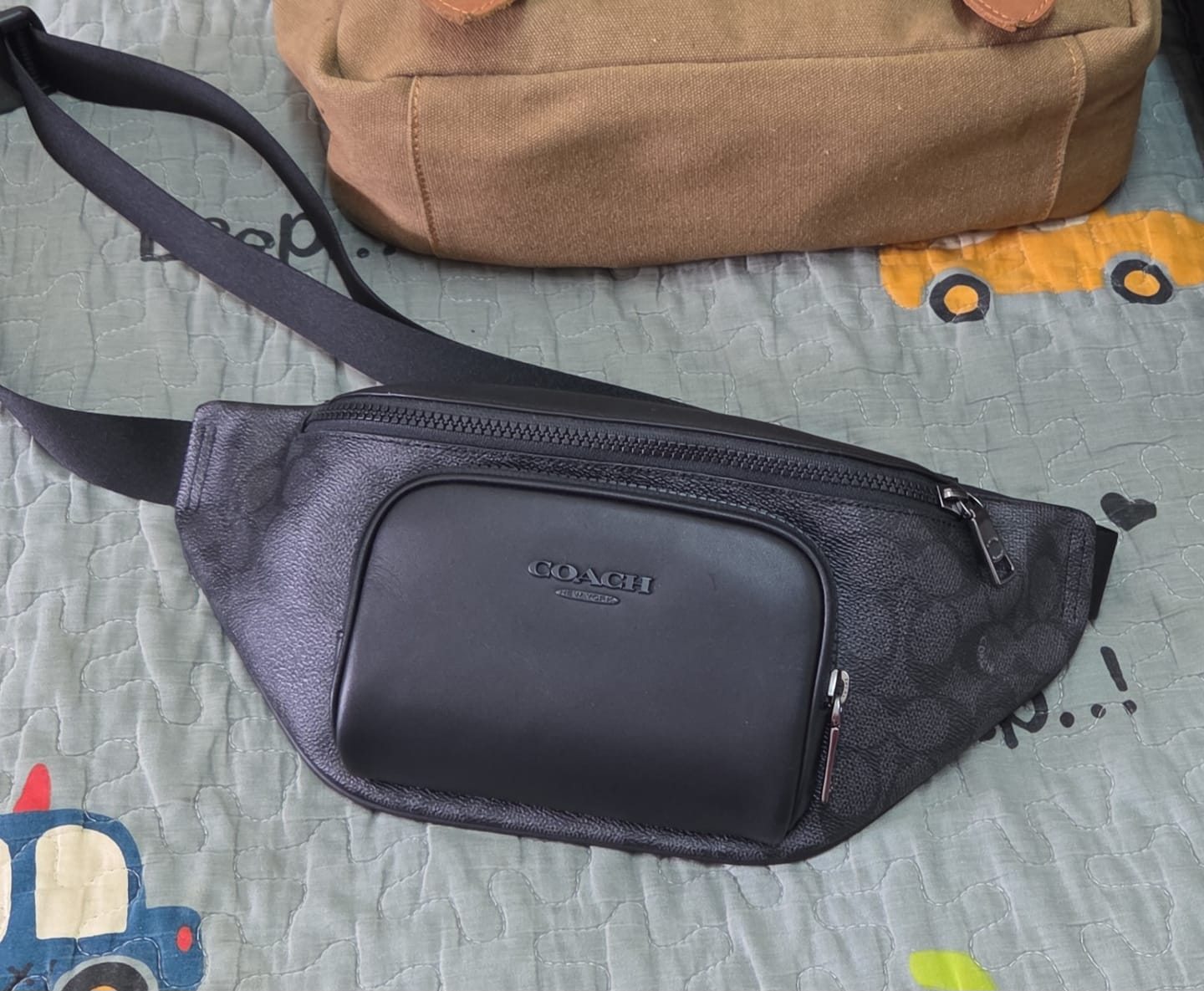 Customer photo review of Coach Corner Zip Wristlet With Stripe In Khaki Black CS602