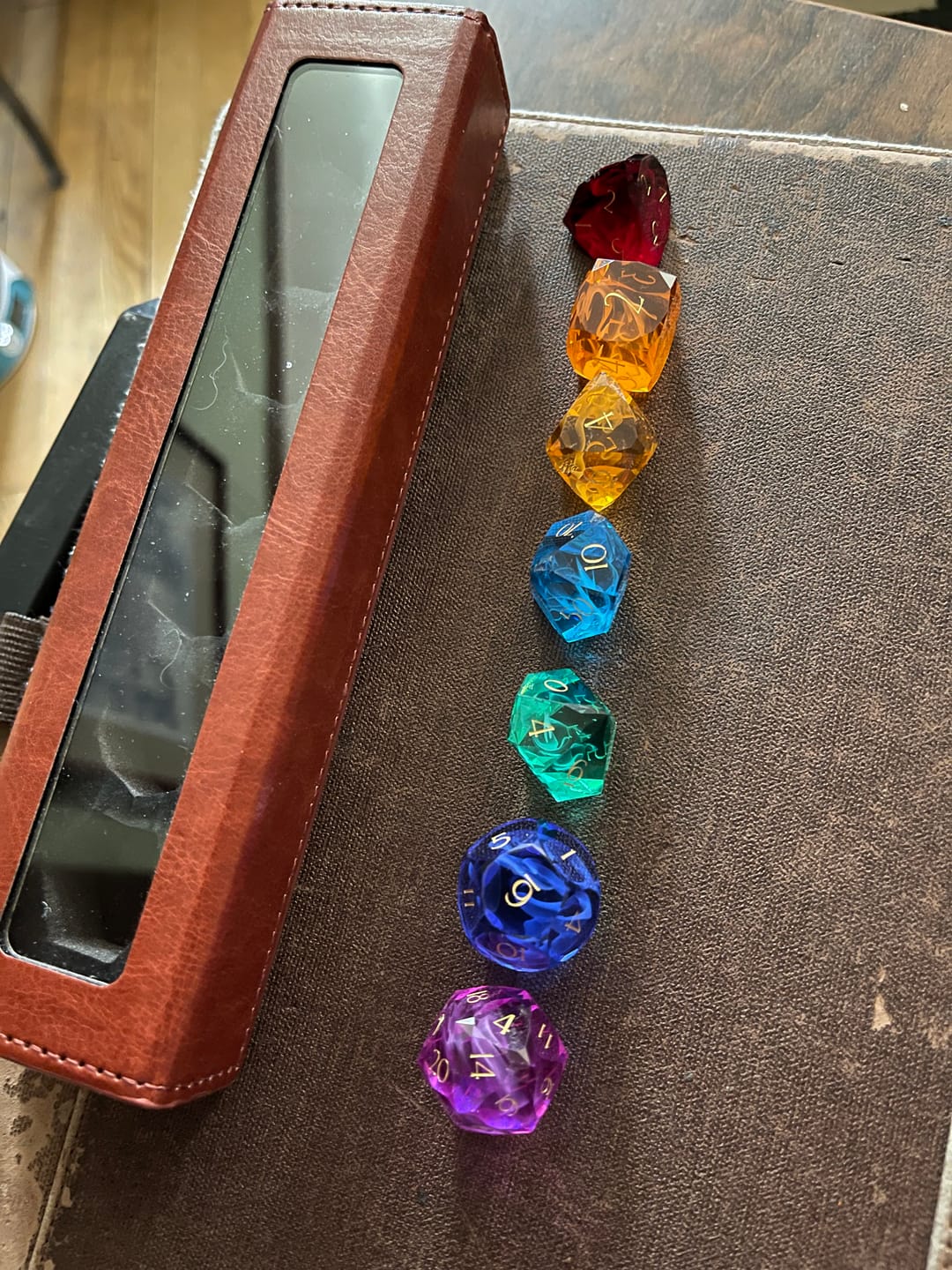 Customer photo review of URWizards D&D Resin Rainbow Engraved Dice Set Multi-faceted Style