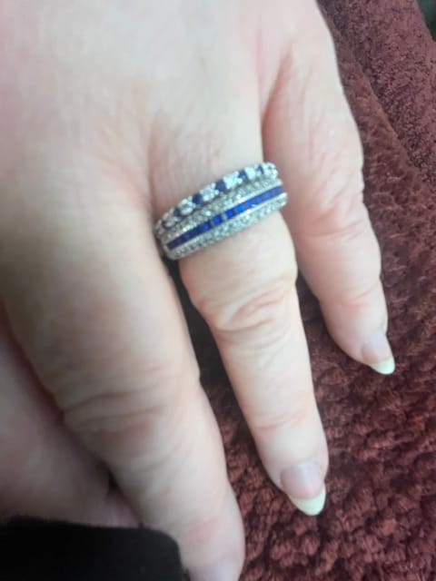Customer photo review of Alternating Moissanite And Sapphire Eternity Wedding Band Ring