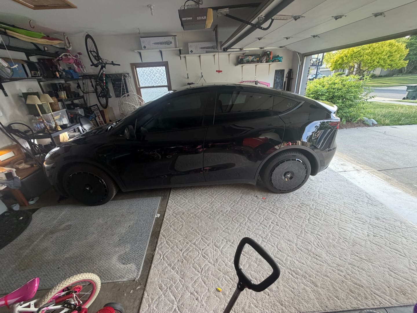 Customer photo review of EVAAM® Stylish Fully Wrapped Wheel Hubcap For Tesla Model 3/Y (4 PCS)