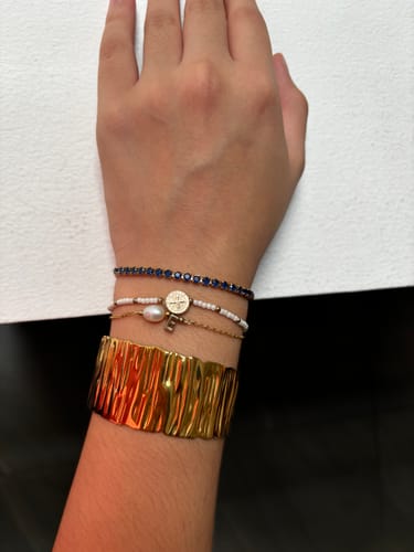 Customer photo review of Pulsera Chaquiras Con Dije