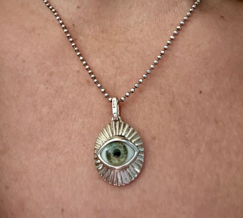Customer photo review of Mini Starburst Eye Pendant