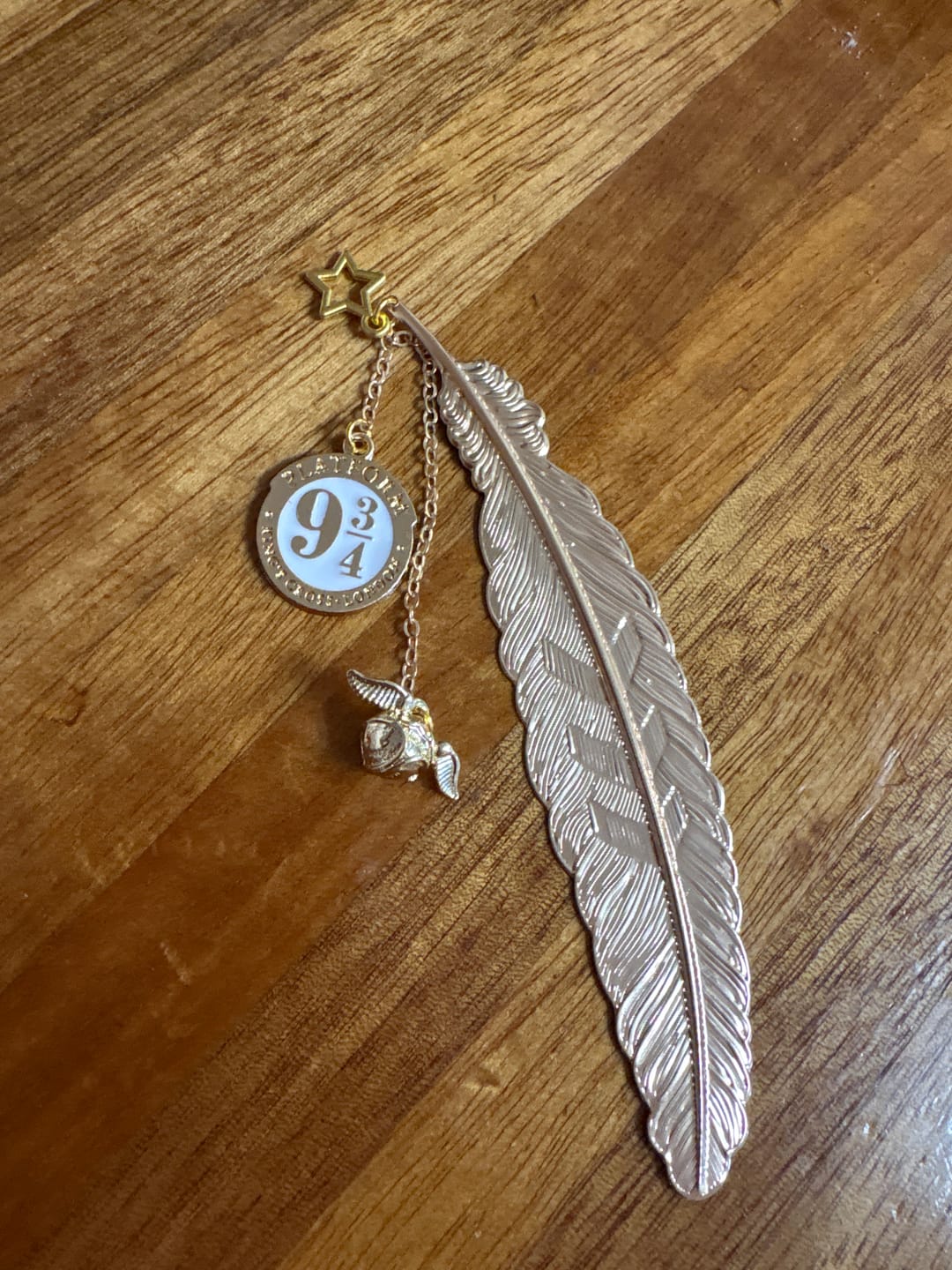 Customer photo review of Harry Potter Gold Feather Bookmarks