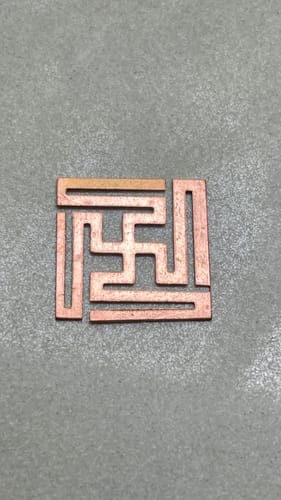 Customer photo review of Copper Nandavrat Swastik Yantra – Vastu Remedy for Wall Defects | Entrance Energy Activation | 1 Inch