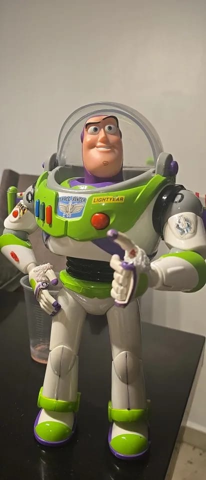 Customer photo review of Toy Story Buzz Lightyear Action Figure - Cute Funny Expression Finger Toy for Kids Collectible Disney Character Gift