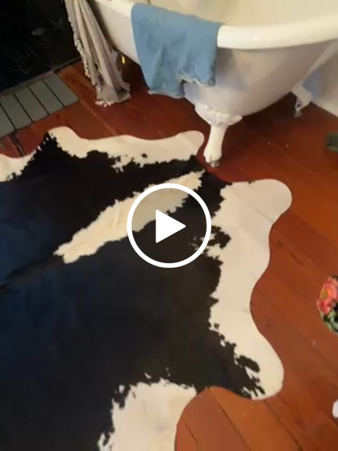 Customer video review of SUPER SALE Black & White Natural Cowhide Rug - X-Large 7' 5"H x 6' 3"W
