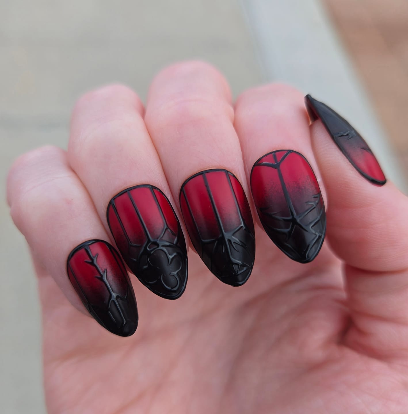 Customer photo review of Enchanted Gate Press-On Nails – Red to Black Ombre Fake Nails with 3D Gothic Gate Designs