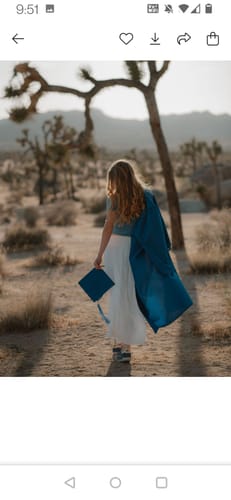 Customer's graduation photo in a desert landscape, edited using the Old Money Style Lightroom Presets.