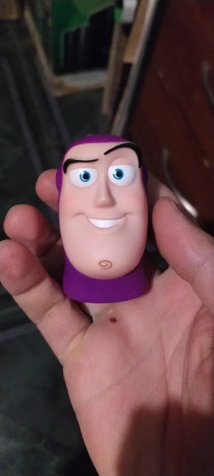 Customer photo review of Toy Story Buzz Lightyear Action Figure - Cute Funny Expression Finger Toy for Kids Collectible Disney Character Gift