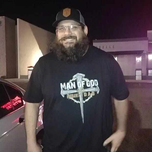 Customer photo review of Man of God Dad Shirt, Christian Husband Father Tee, USA Flag Faith Gift, Father’s Day Gift
