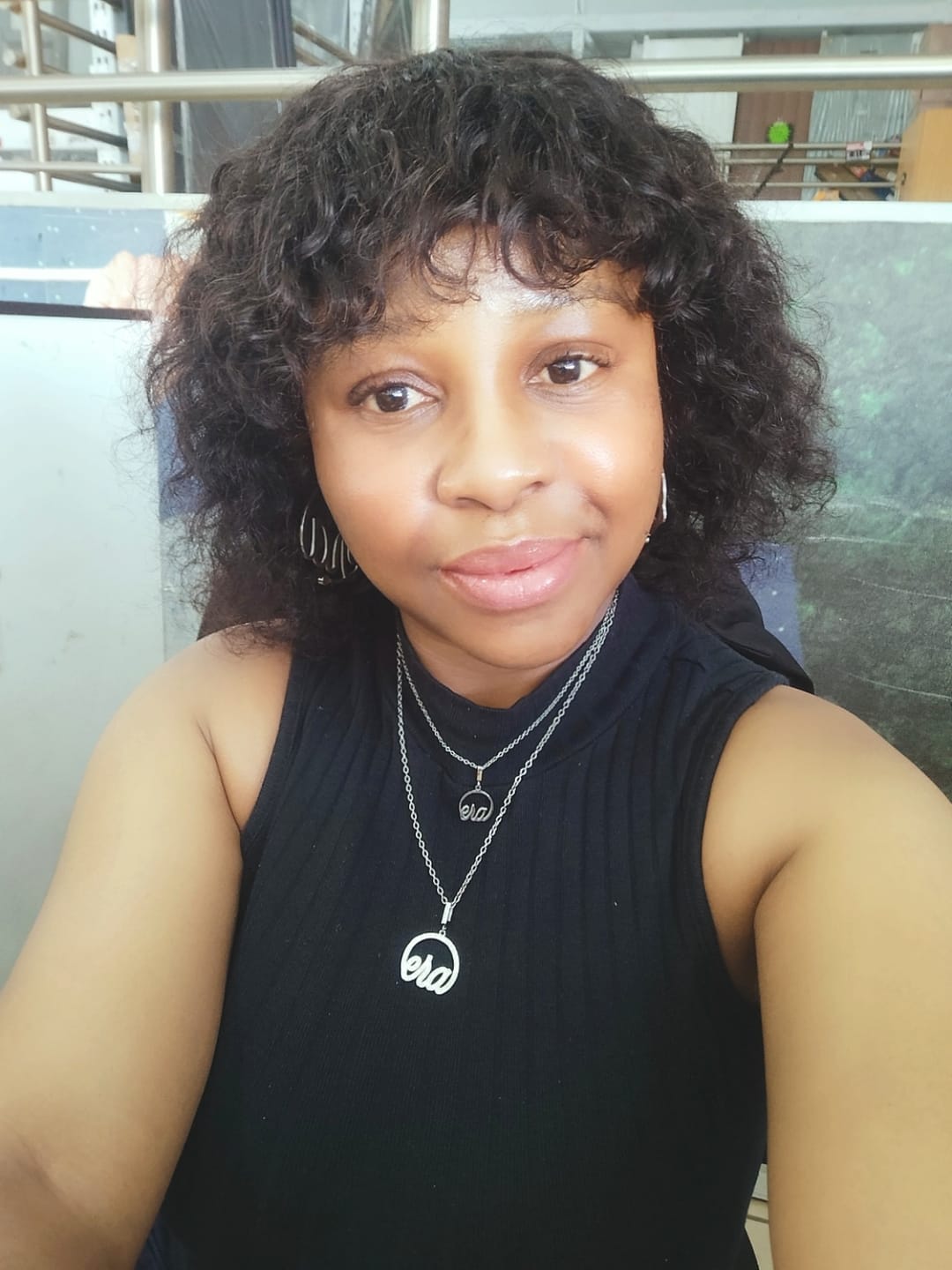 Customer photo review of Silver Precious Logo Necklace
