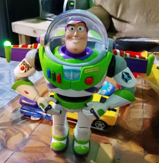 Customer photo review of Toy Story Buzz Lightyear Action Figure - Cute Funny Expression Finger Toy for Kids Collectible Disney Character Gift
