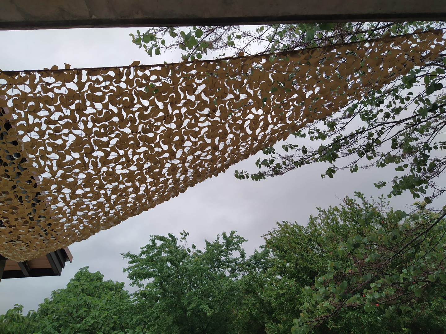 Customer photo review of Filet de camouflage triangulaire sable