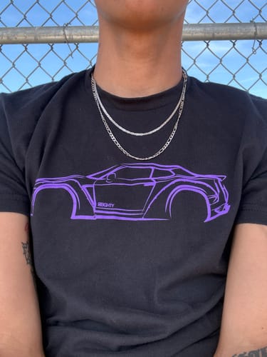 Customer's close-up of the black 80Eighty® DCG88 Shirt, showing the purple car outline graphic.