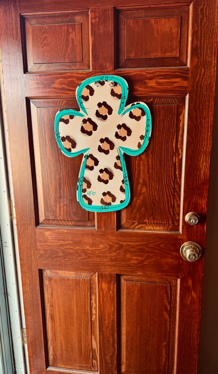 Customer photo review of Turquoise Testimony Leopard Door Hanger