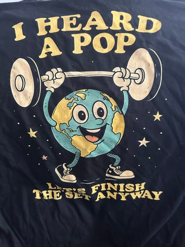 Customer photo review of I Heard a Pop T-Shirt (Back Print)