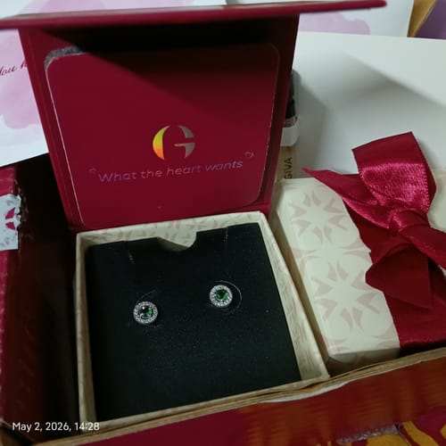 Customer's Silver Forest Green Shining Halo Studs displayed in the open GIVA gift box.