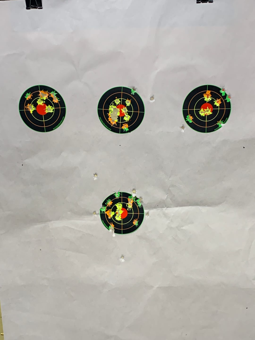 Customer photo review of 4 Inch Splatter Adhesive Bullseye Shooting Target Stickers - 200 Pack