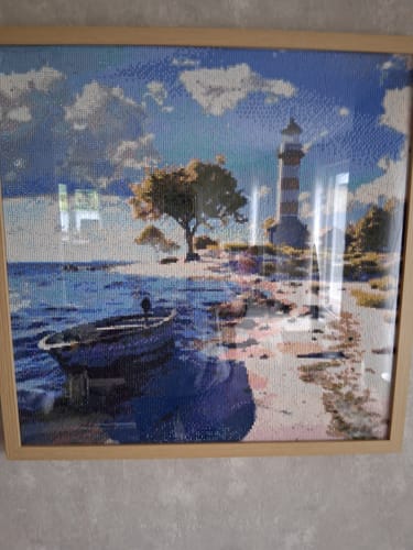 Kundenbewertung mit Foto zu Kleines Boot am Strand