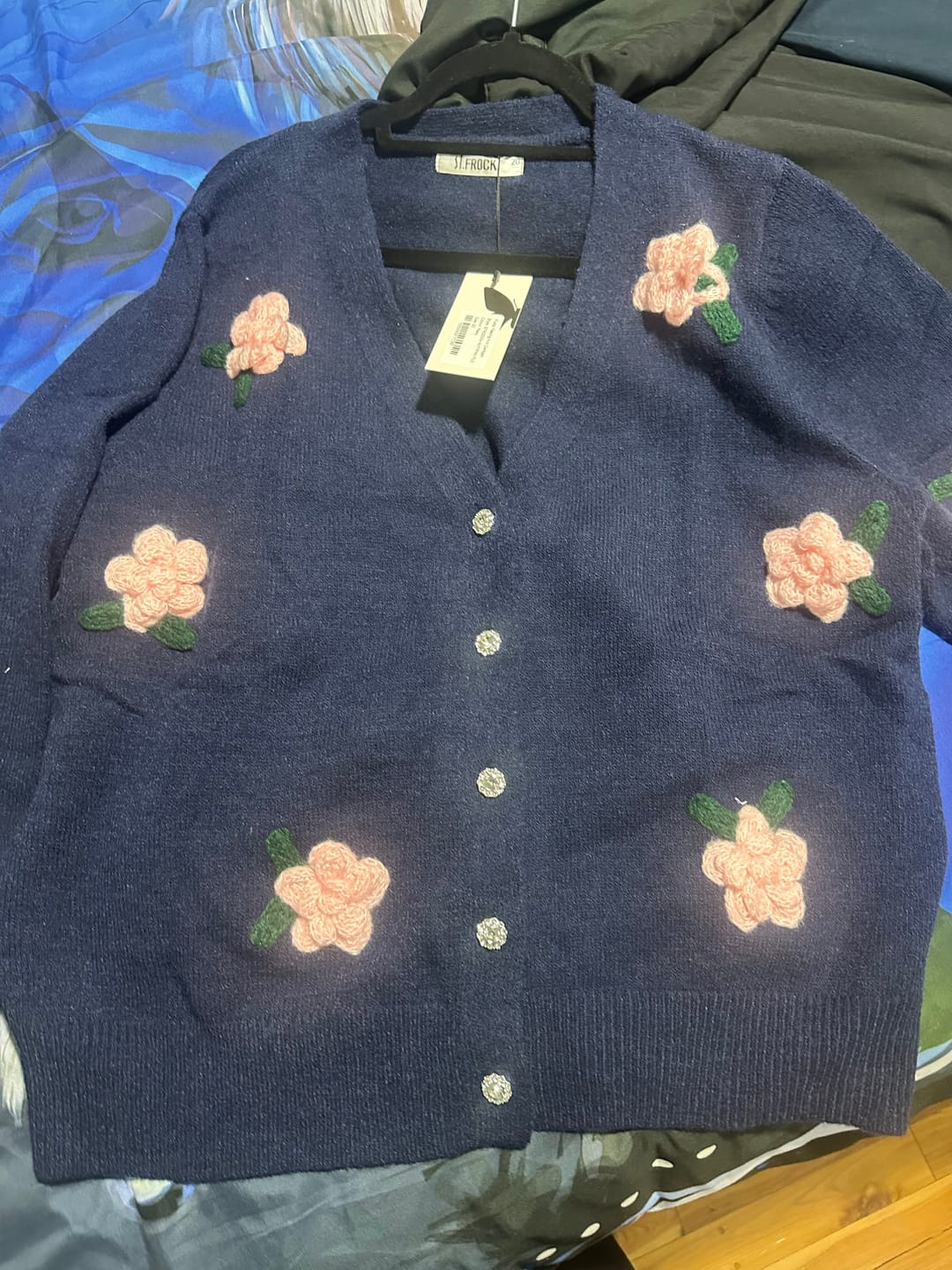 Customer photo review of Fuzzy Feeling Knit Cardigan in Navy with Pink Flower