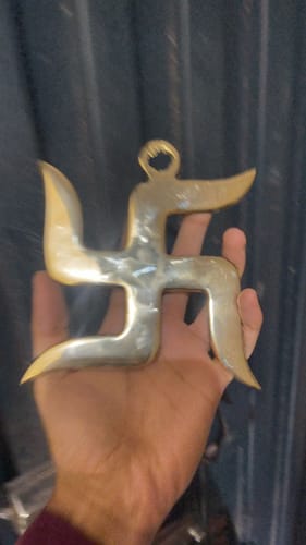 Customer photo review of Brass Swastik – Vastu Remedy for Home Protection | Main Door Dosh Nivaran | 6 & 9 Inch