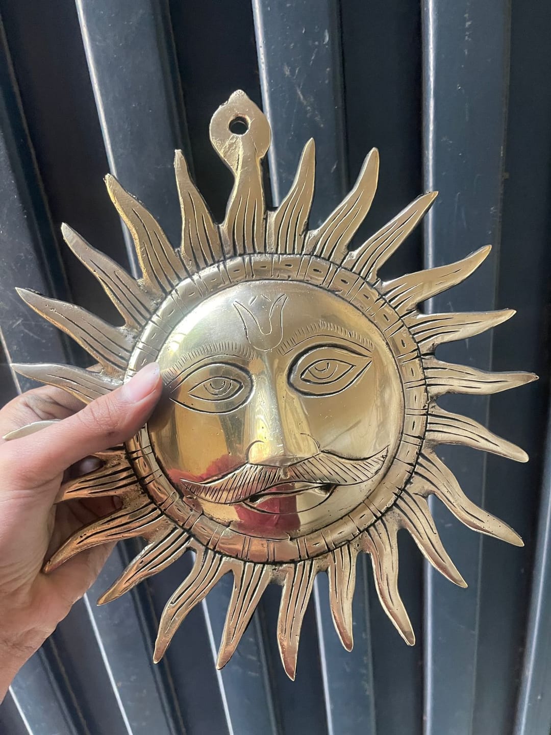 Customer photo review of Brass Surya (Sun) Ji Wall Hanging Idol Vastu Remedy for East Direction Balance, Fame and Positive Energy | 24 X 24 cm | 1 kg