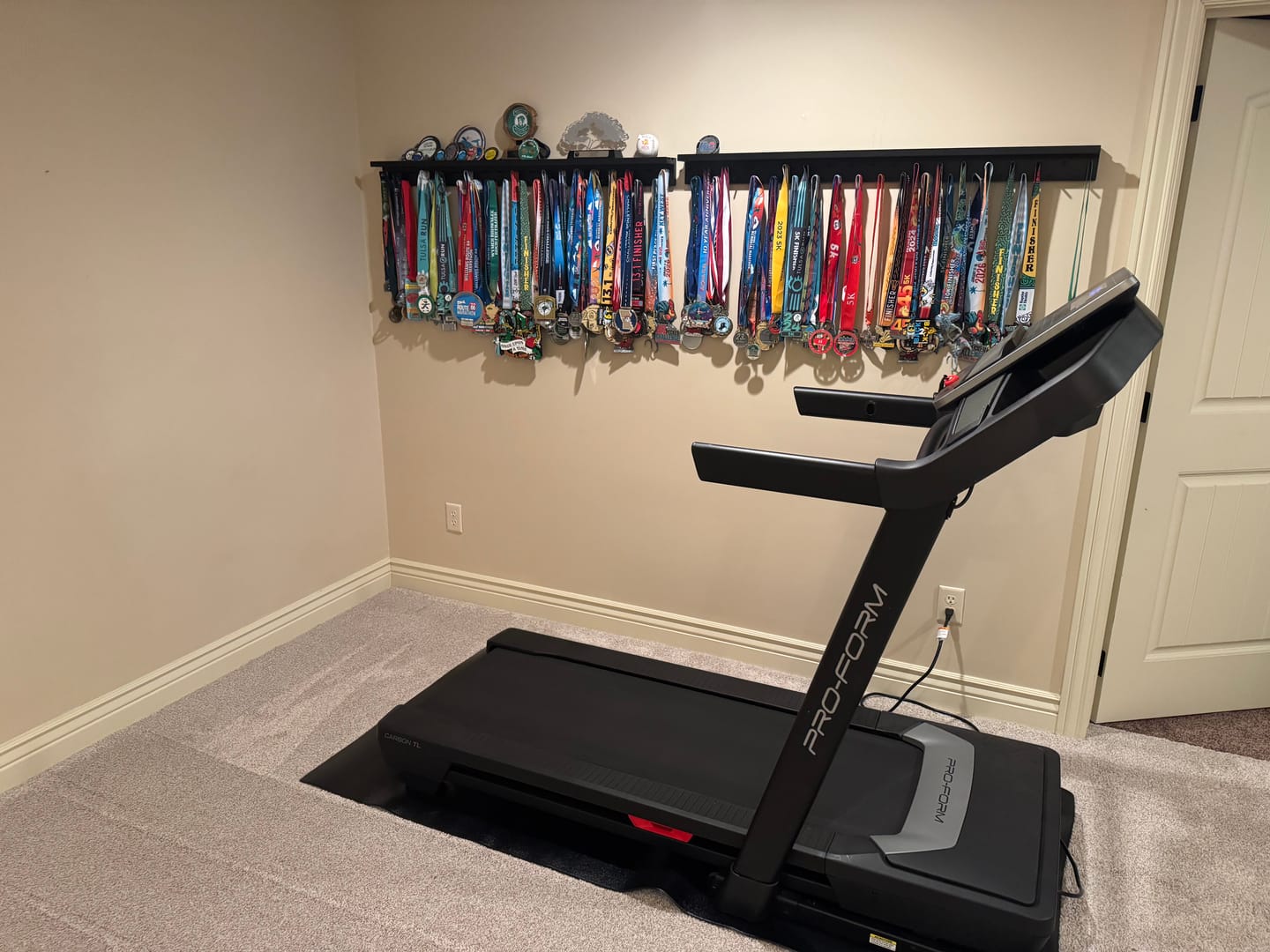 Customer photo review of 4ft Medal Awards Rack Premier Trophy Shelf- Trophy, Plaque and Medal Display