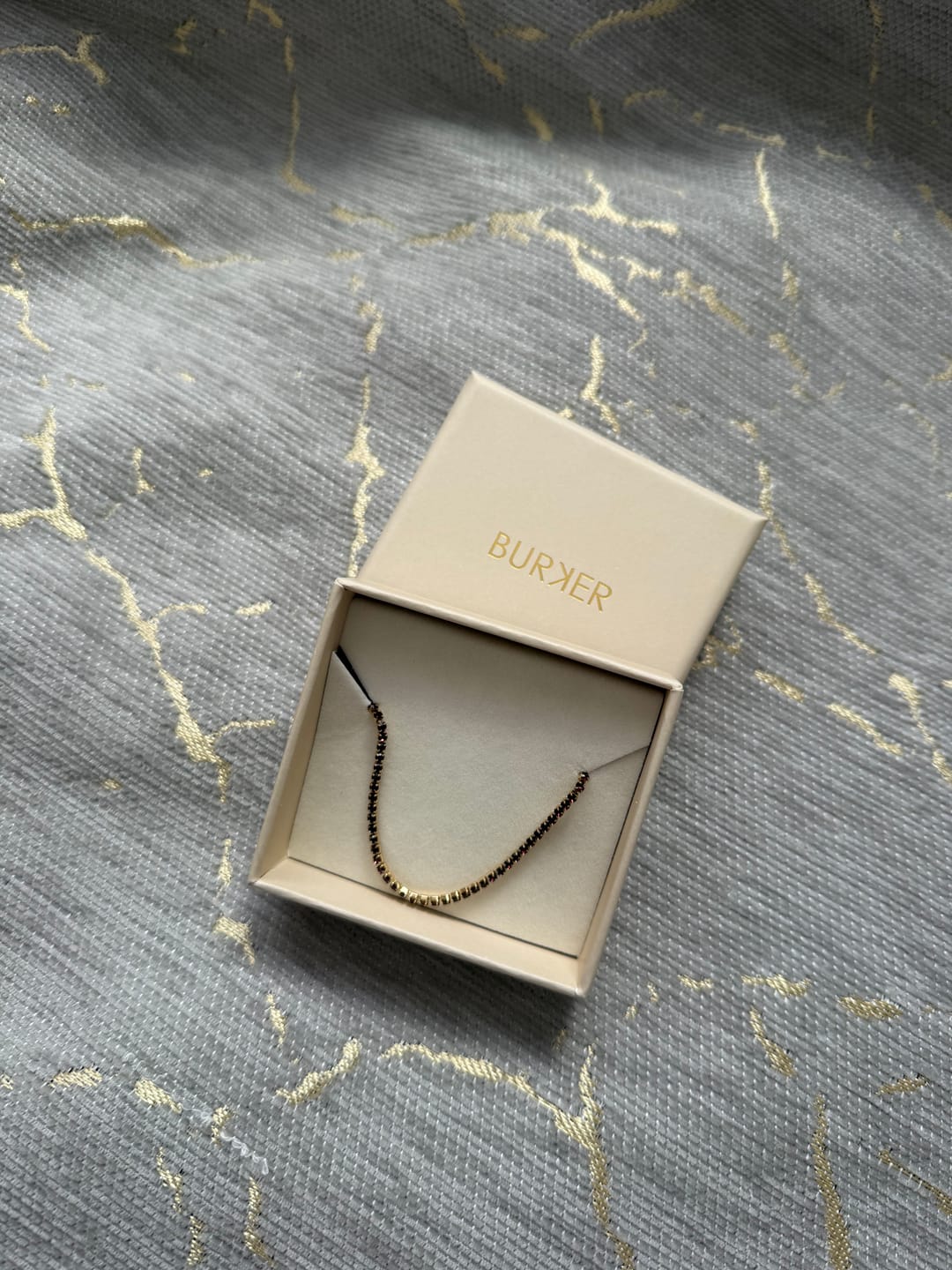 Customer photo review of Ava Petite Gold Burgundy Bracelet