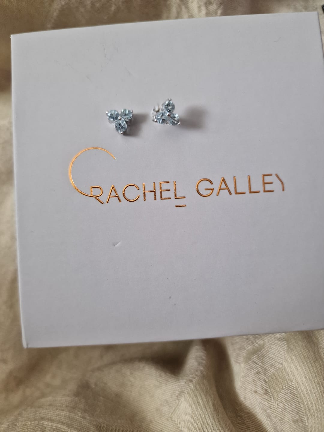 Customer photo review of Trinity Birthstone Sleep Stud Earrings