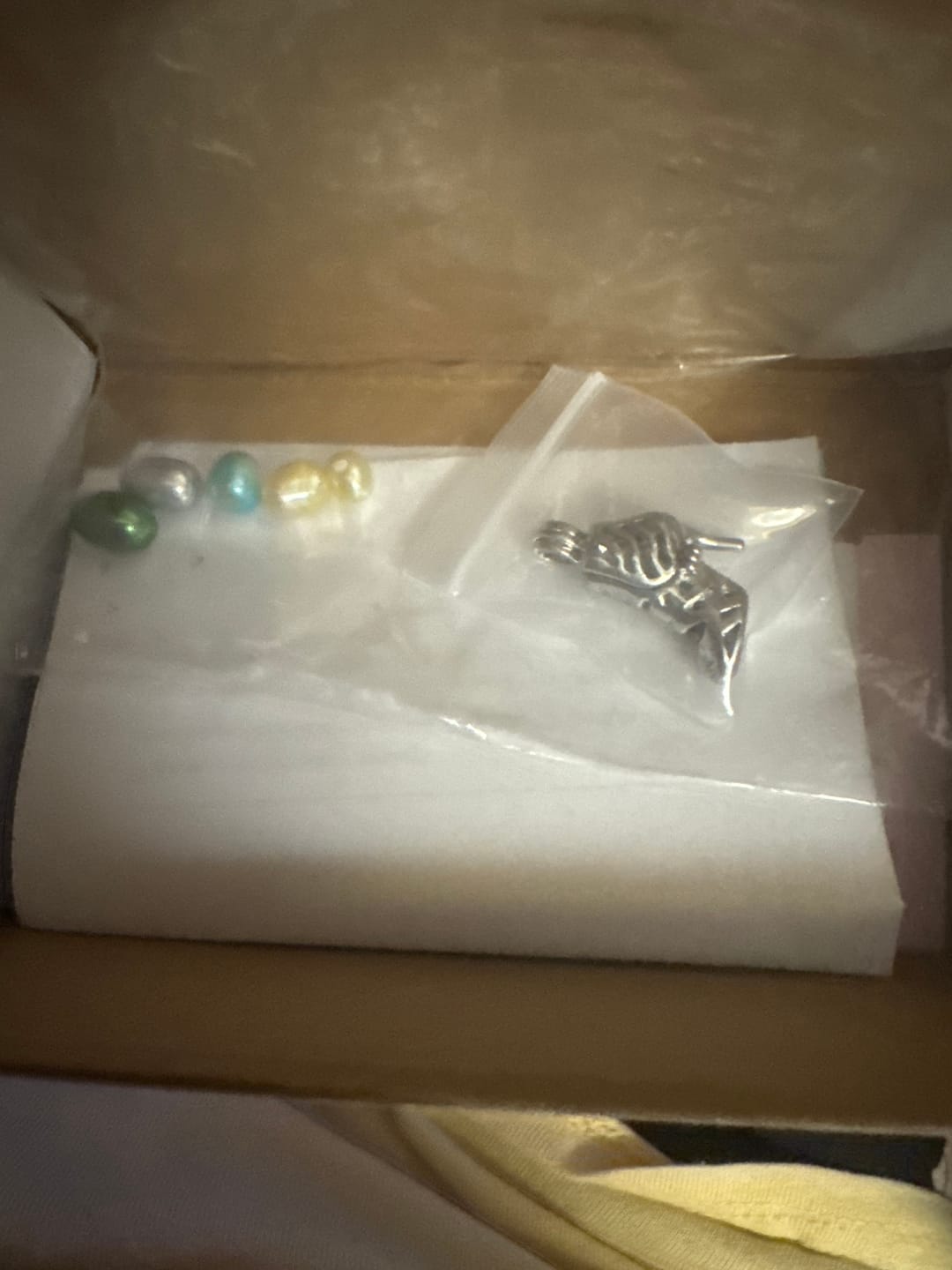 Customer photo review of Tray of Rice Shaped Pearls - Free Cage Pendant