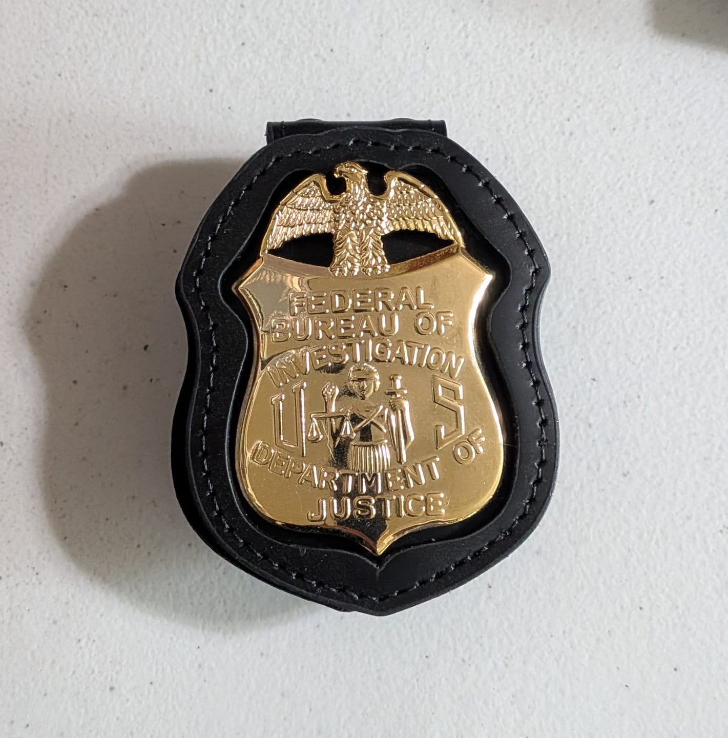 Customer photo review of FBI Department of Justice Badge Solid Copper Replica Movie Props