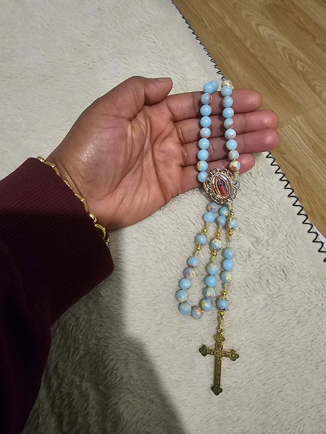 Customer photo review of Christianartworkshop Aqua Stone Prayer Rosary with Gold Accents: A Divine Source of Peace and Devotion