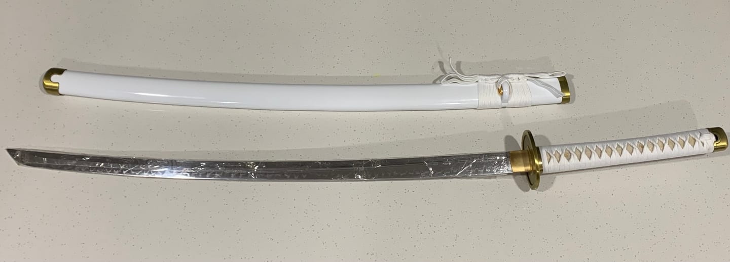 Customer photo review of Wado Ichimonji Zoro Katana One Piece T10 Steel Mirror Finish