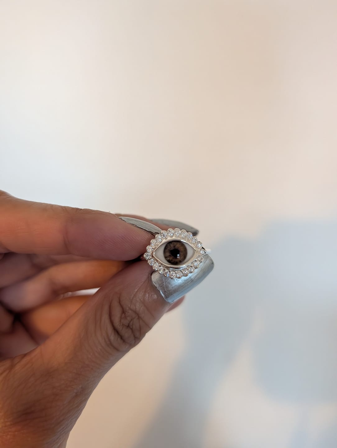 Customer photo review of Custom Mini Eye Ring with moissanite halo
