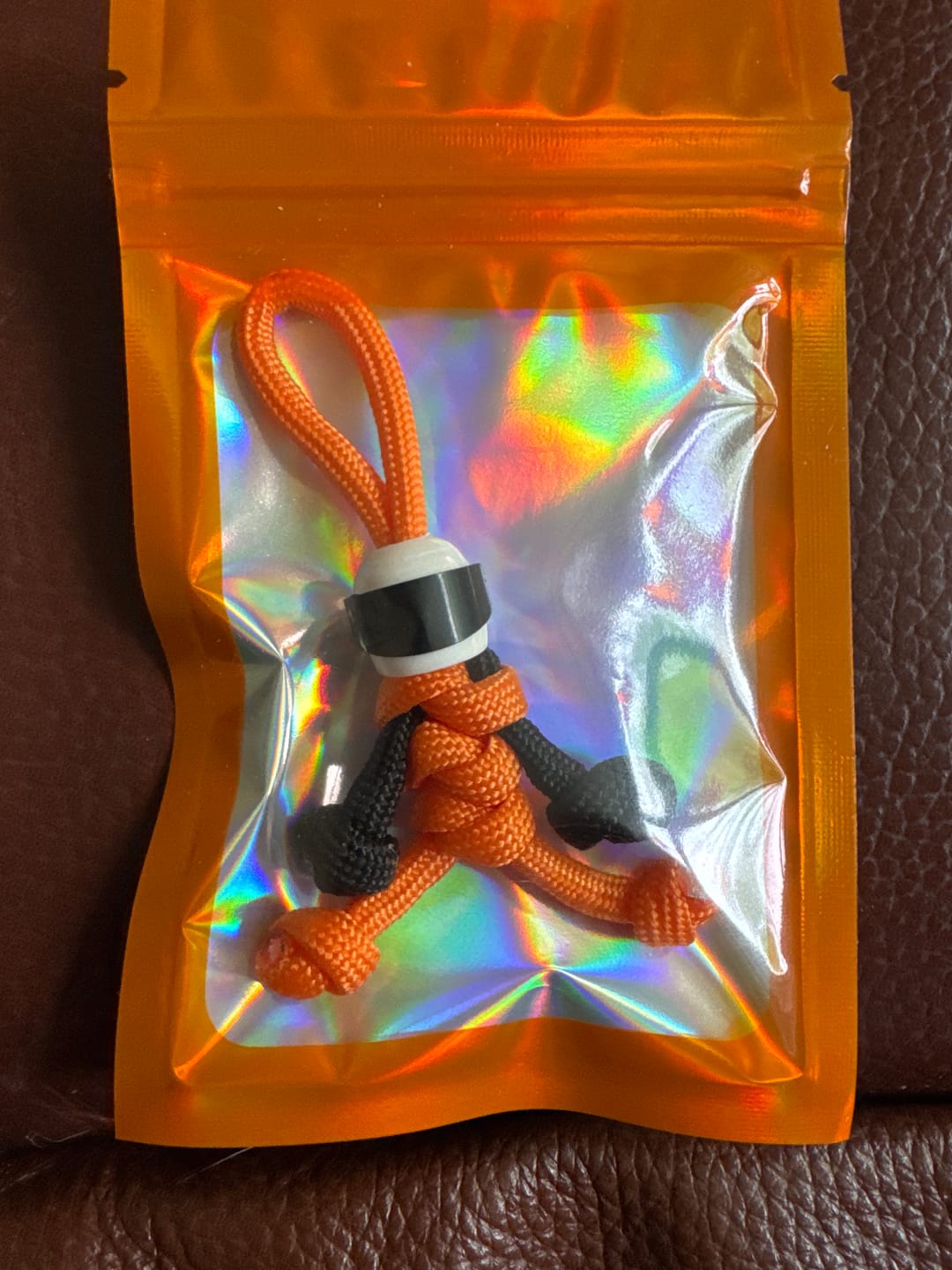 Customer photo review of Orange Biker Buddy Paracord Keychain