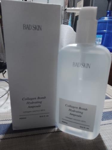 Customer's Bad Skin Korean Collagen Bomb Hydrating Ampoule in a clear bottle next to its tall white box.