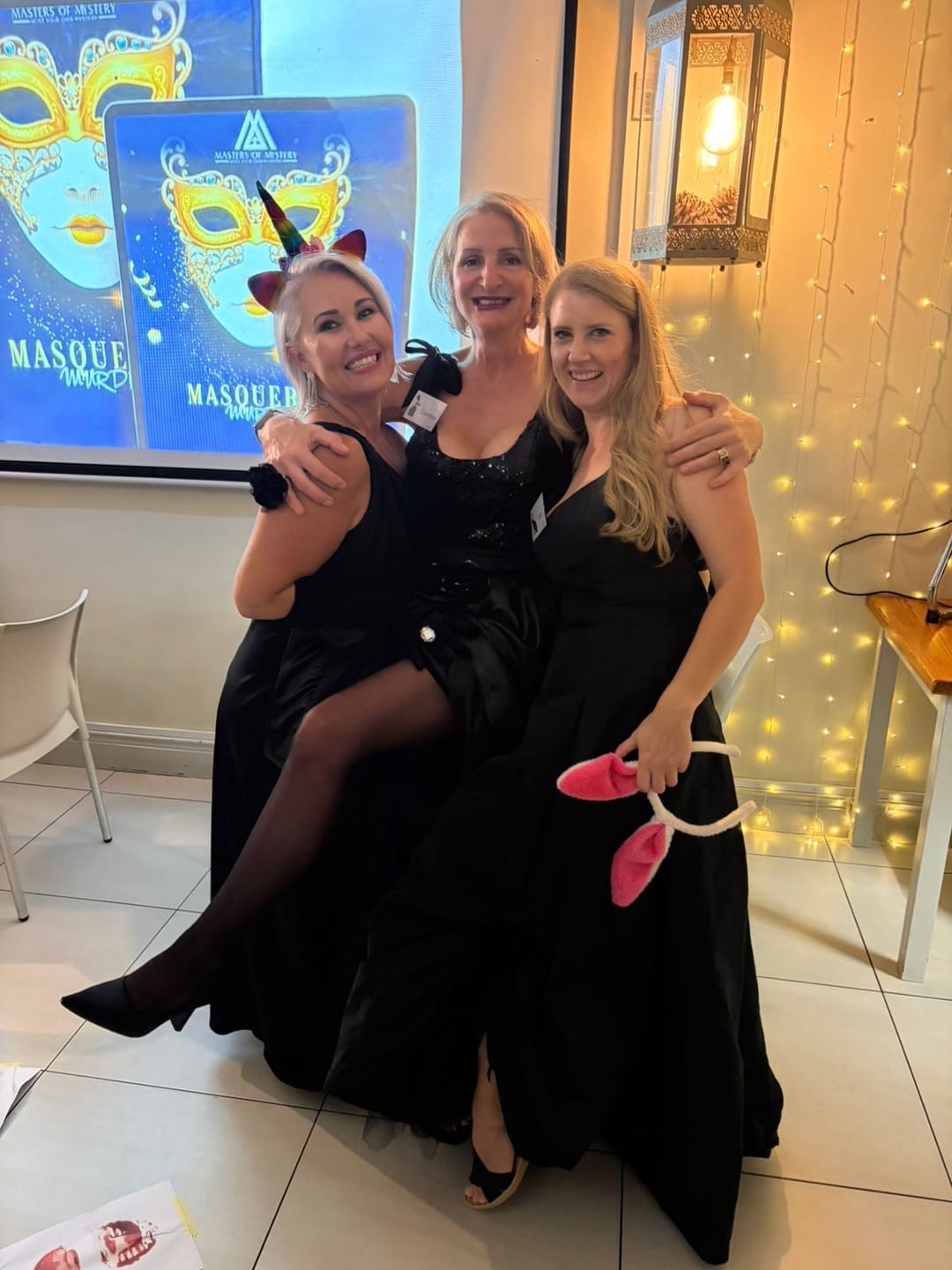 Customer photo review of Masquerade Ball/Carnival Murder Mystery Host Your Own Game Kit