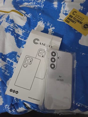 Customer's new Anti Yellow Clear Case for Galaxy S25 in its packaging, displayed with the box and warranty card.