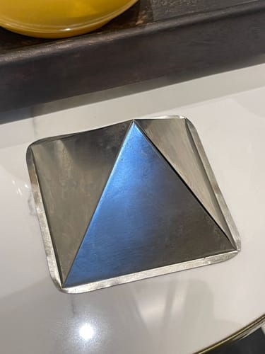 Customer photo review of Tri-Dhatu Hollow Vastu Pyramid – Alloy Metal Vastu Remedy for Protection & Prosperity | Ideal for Home, Office & Spiritual Areas | 4 cm | 120 g