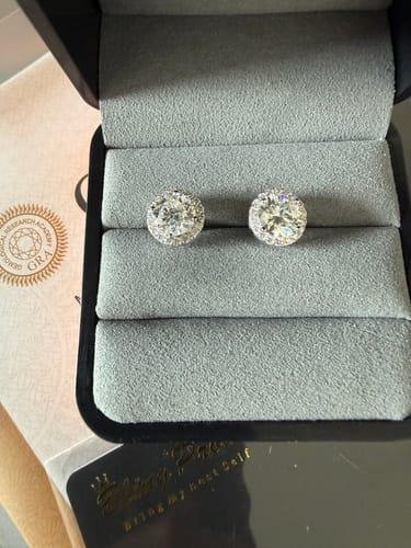 Customer photo review of S925 Moissanite Diamond Halo Round Stud Earrings in 925 Sterling Silver - 2.0 Carat