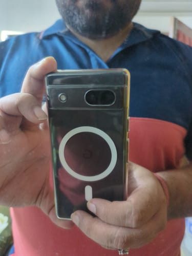 Customer holding their Google Pixel 7A, showing the back of the clear Anti Yellow Magsafe Case.